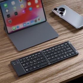 Ultra-thin foldable 66-key wireless keyboard