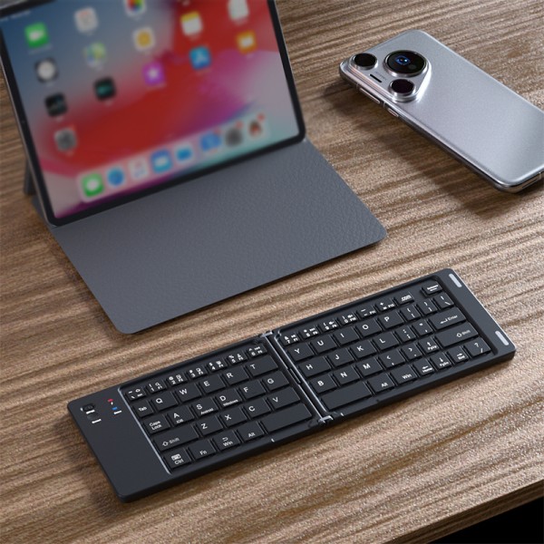 Ultra-thin foldable 66-key wireless keyboard